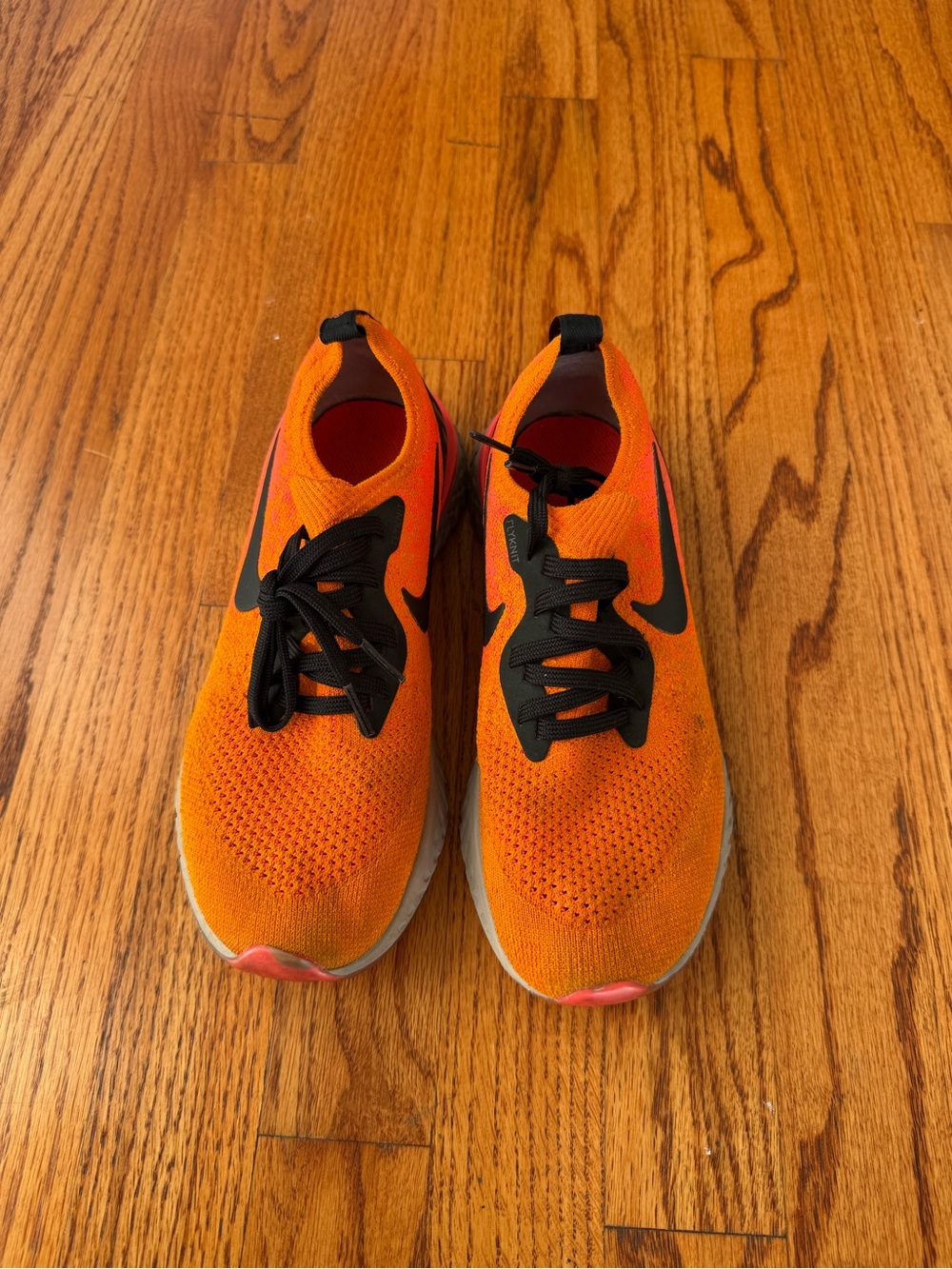 Nike Kids Orange Sneakers with Black Accents
